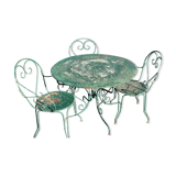 Garden table, two armchairs and a metal chair