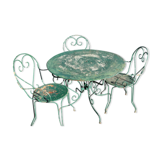 Garden table, two armchairs and a metal chair