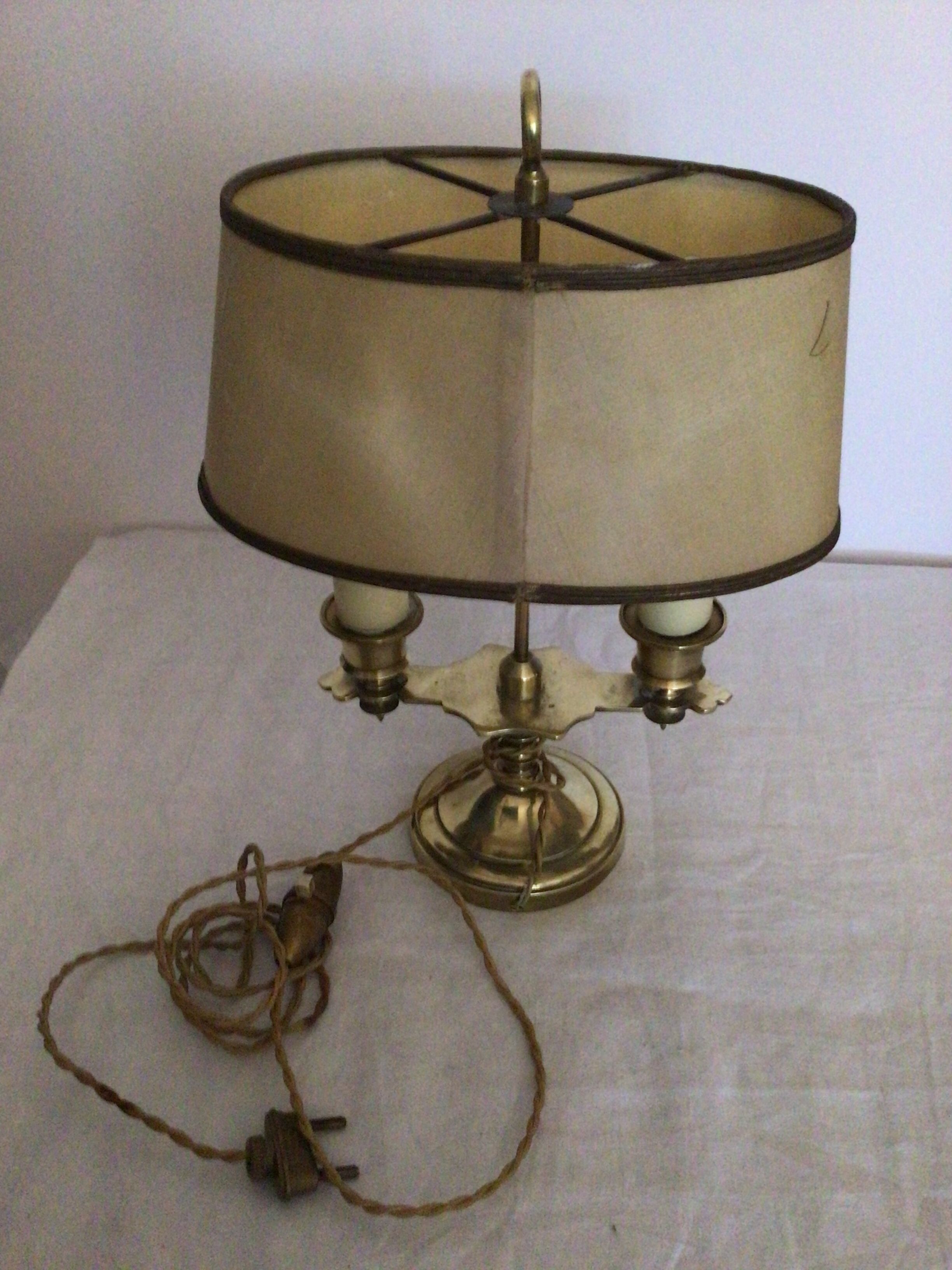 Old golden brass hot water bottle lamp with 2 arms of light