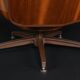 Restored George Mulhauser style white tufted tilt and swivel chair with ottoman