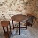 Vintage oak nesting tables set, round coffee table from the 1960s with two integrated side tables.