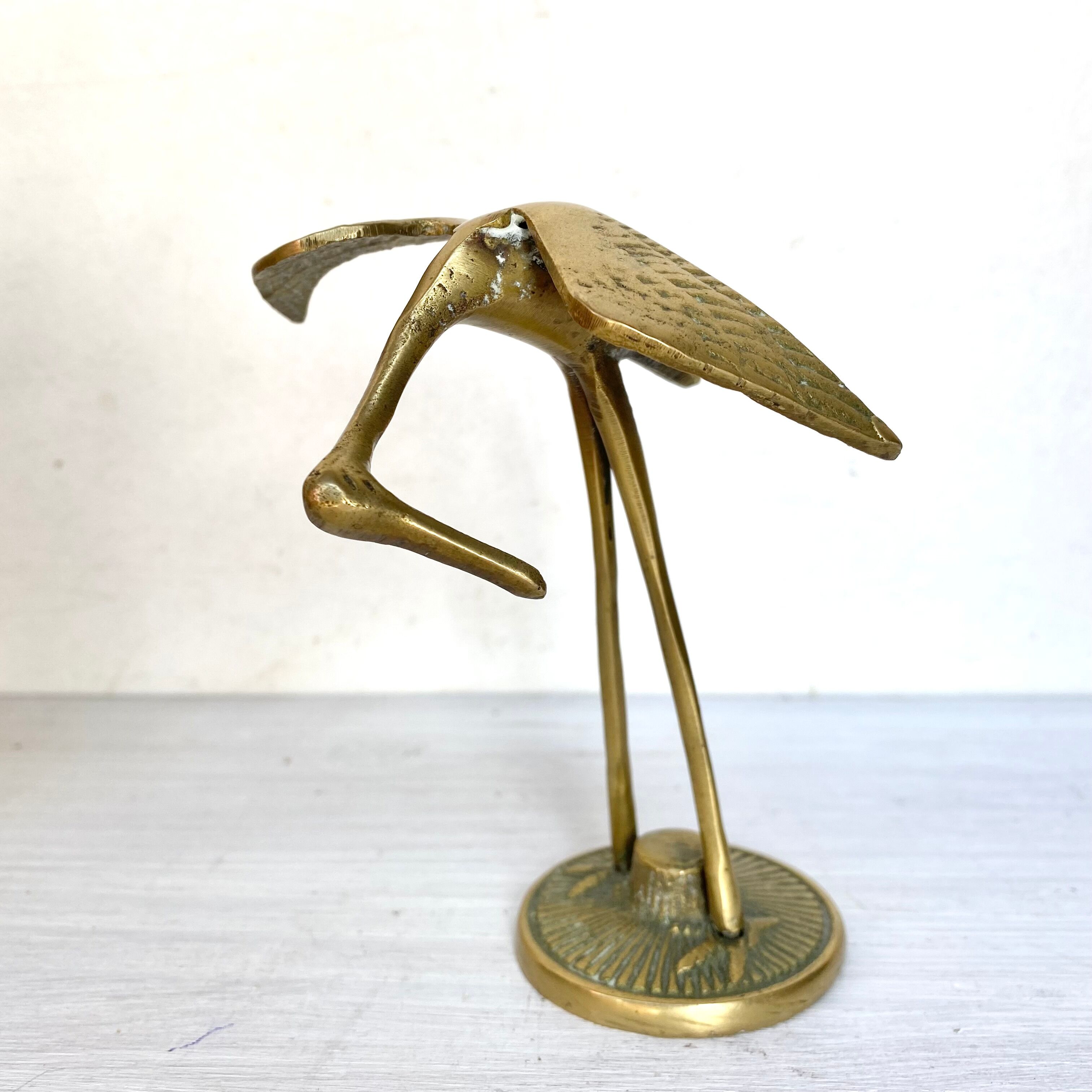 Golden brass bird