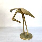 Golden brass bird