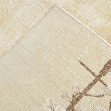 Faded beige classic vintage rug