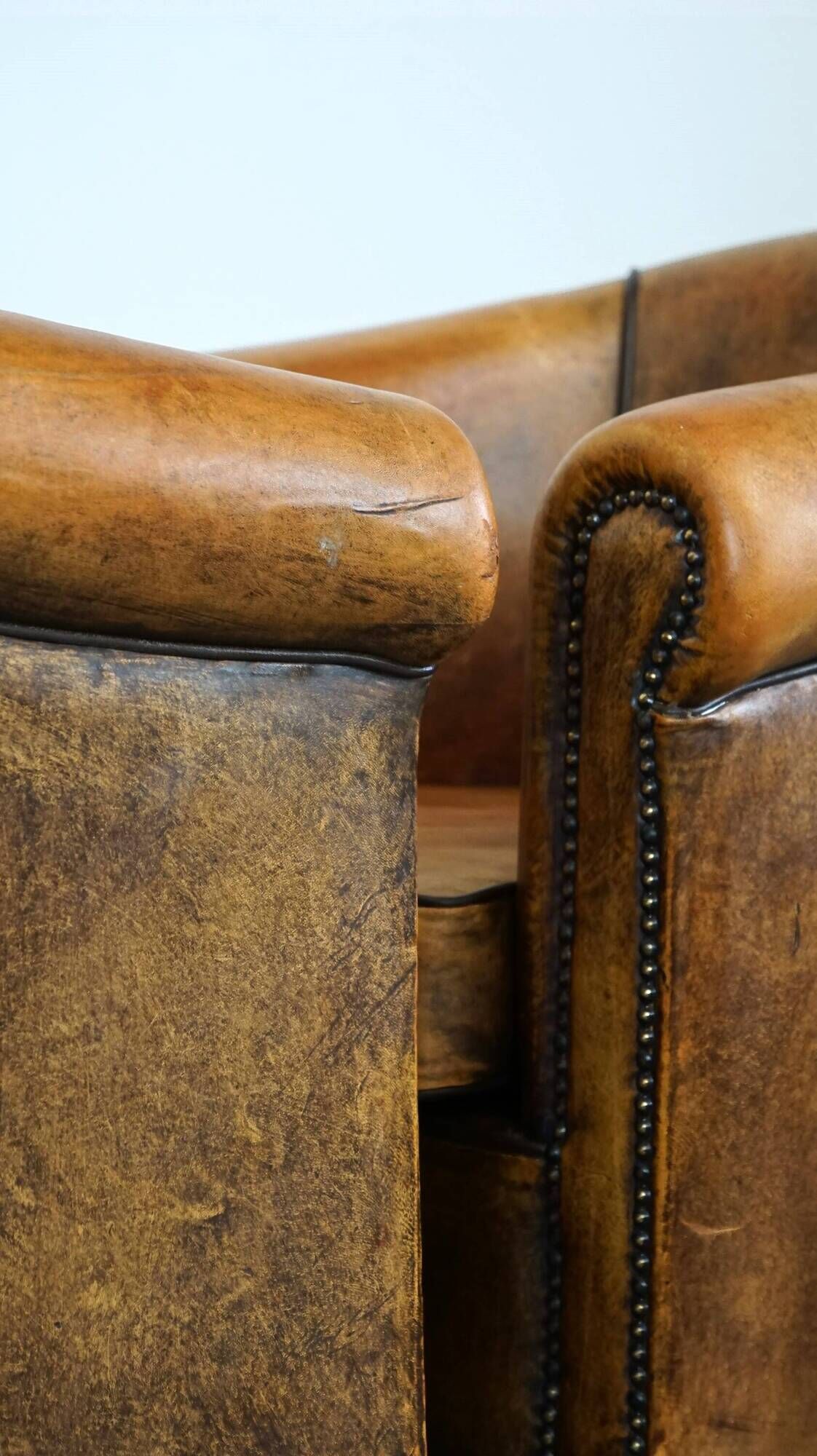 Set of 2 stylish yet beautiful and comfortable sheepskin club armchairs