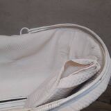 Wicker and painted wood baby cradle