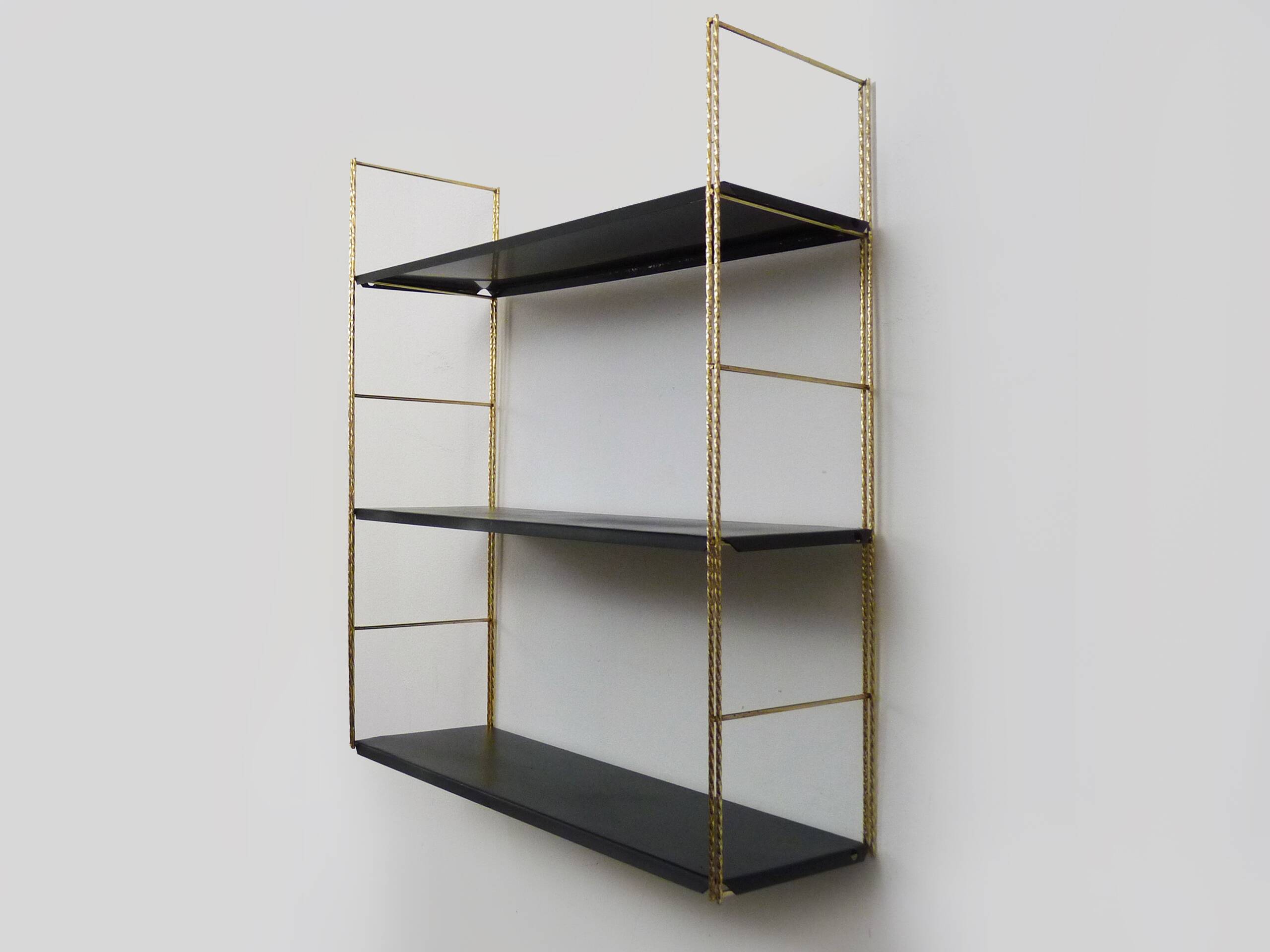 Vintage black and gold String design shelf. 60s