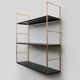 Vintage black and gold String design shelf. 60s