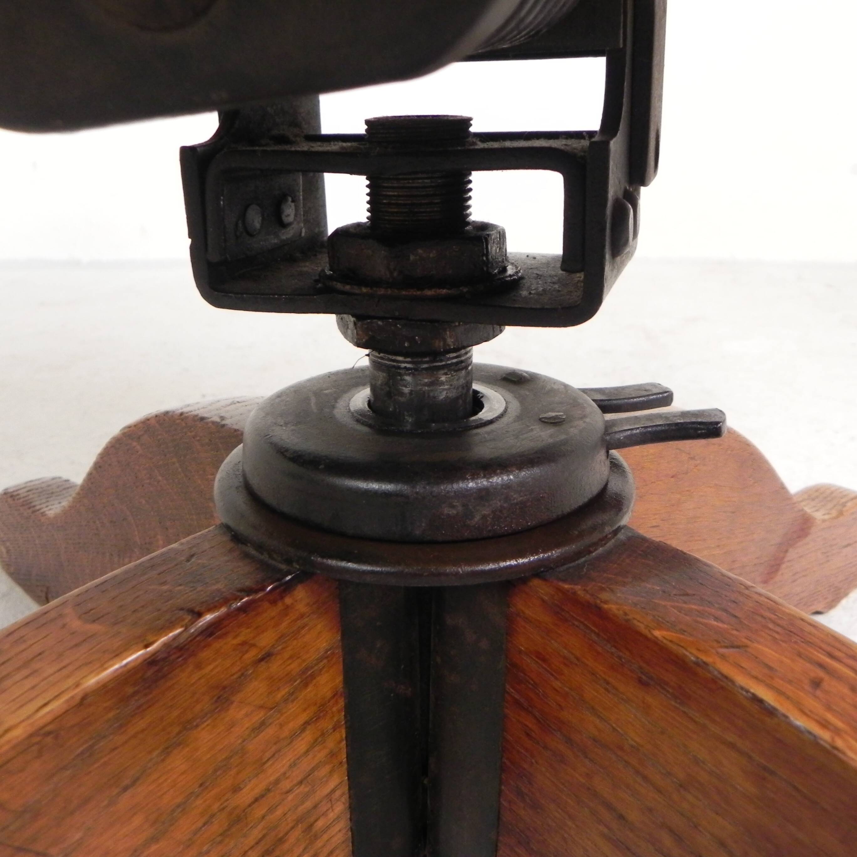 Oak office chair with a spring system and height adjustable, 1930s.