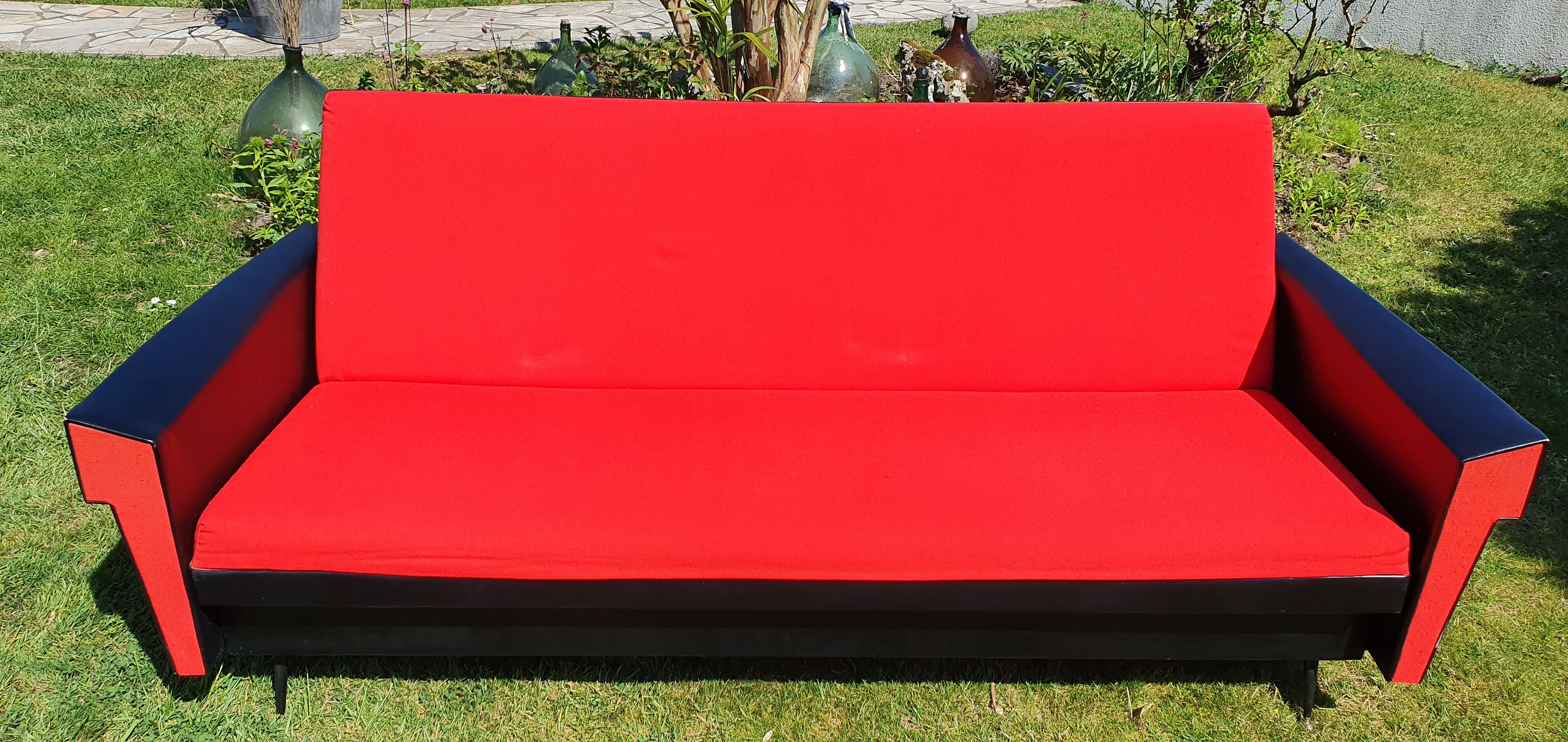 Vintage sofa 3 places convertible, red fabric and black skaï.1960s.