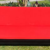 Vintage sofa 3 places convertible, red fabric and black skaï.1960s.