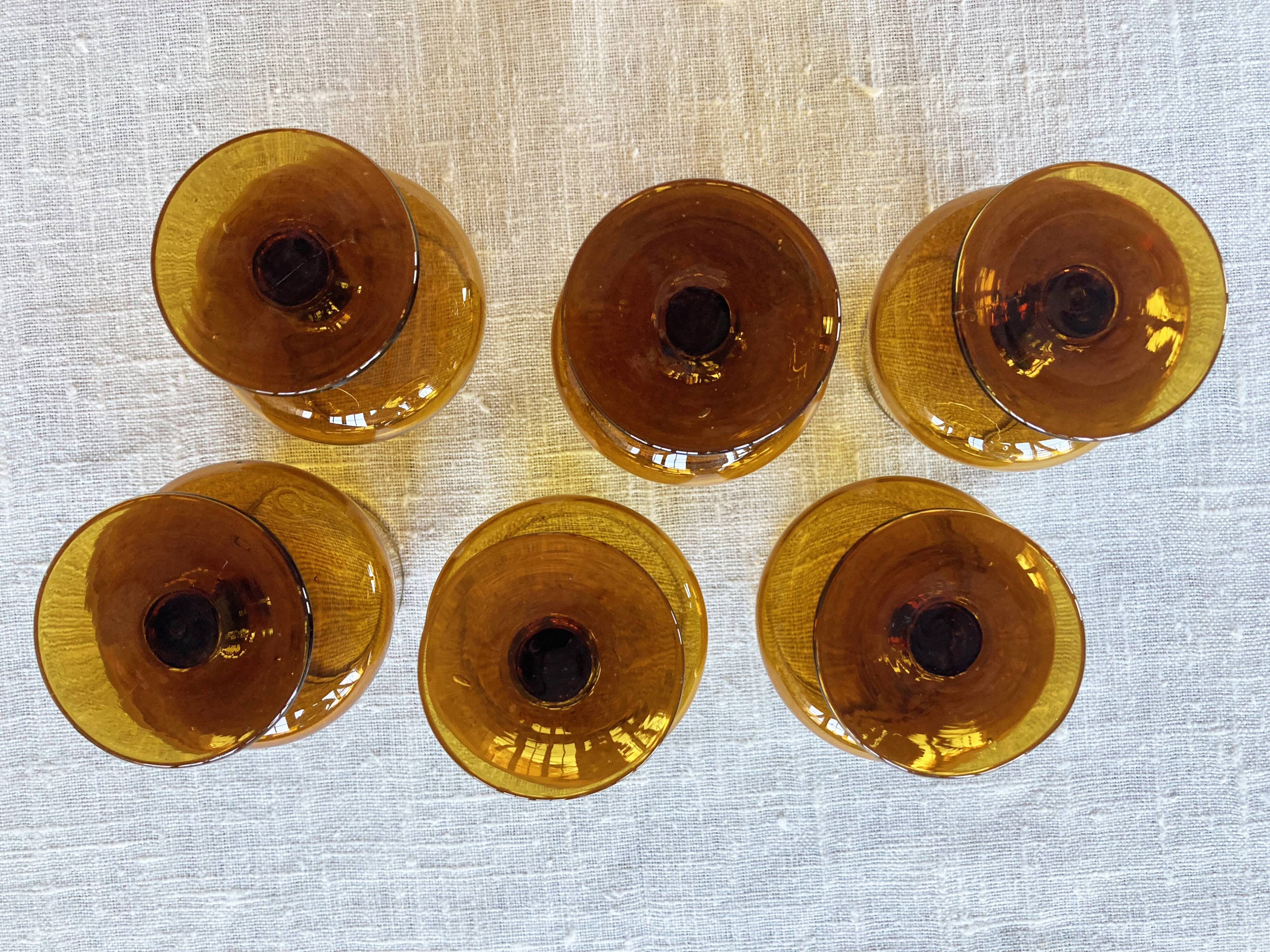 6 small amber glass stemmed glasses