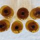 6 small amber glass stemmed glasses
