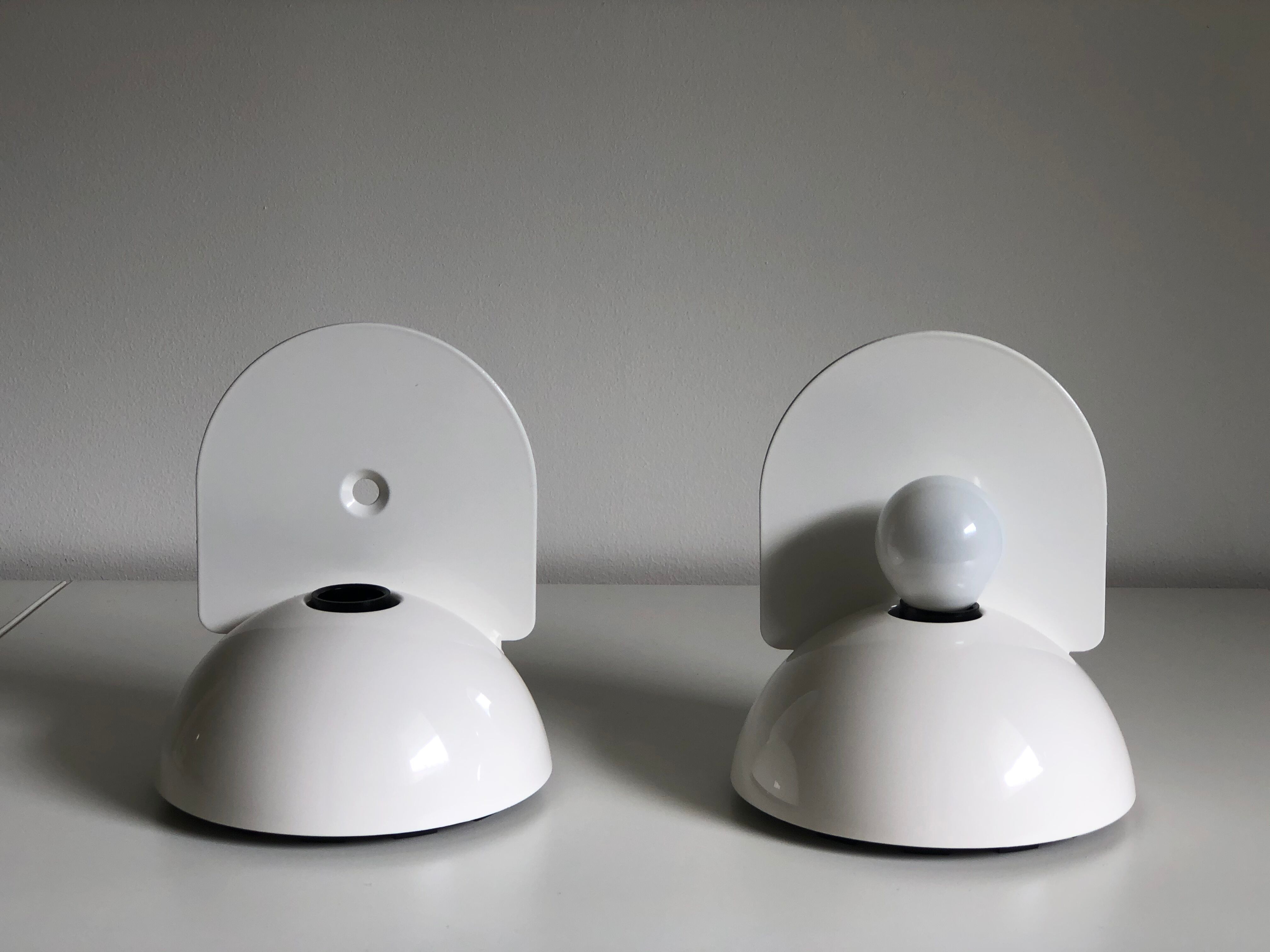 White Buco applior by Claudio Dini edited by Artemide, 1974