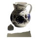 Very large vintage ceramic carafe in white glazed with blue floral decoration.