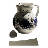 Very large vintage ceramic carafe in white glazed with blue floral decoration.