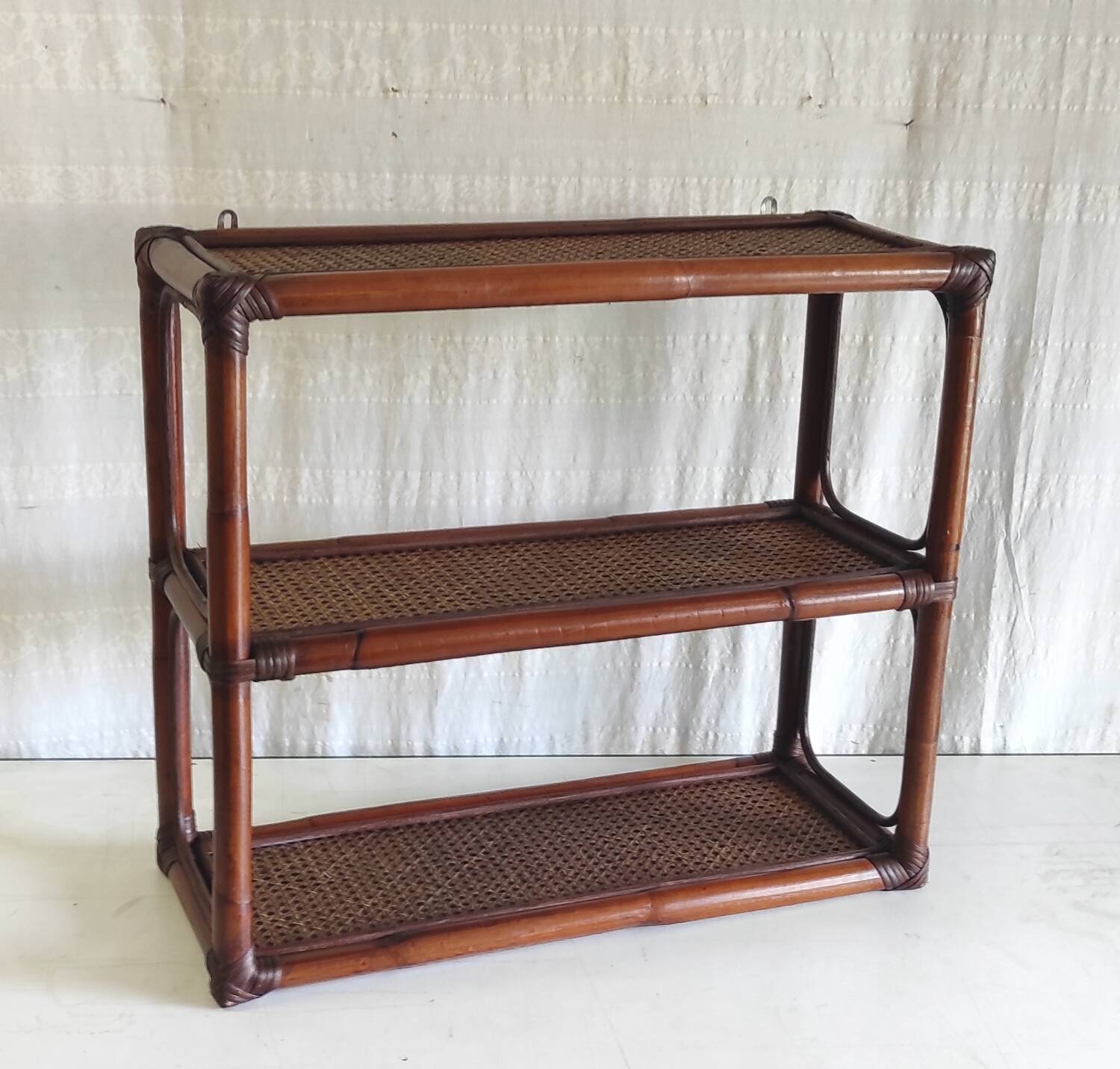 Rattan and cane wall shelf - late 20th century
