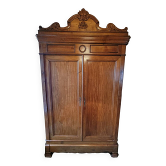 Antique cabinet with carved cornice