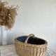 Large vintage wicker basket and blue lining with white polka dots