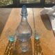 Liquor service consisting of a blue glass decanter and. 3 small antique glasses