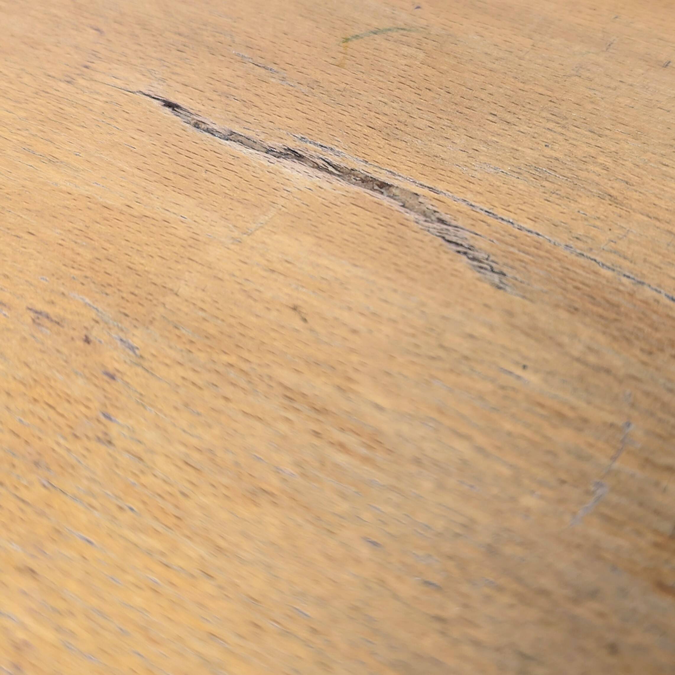 Old curved wooden children's desk.