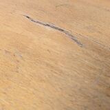 Old curved wooden children's desk.