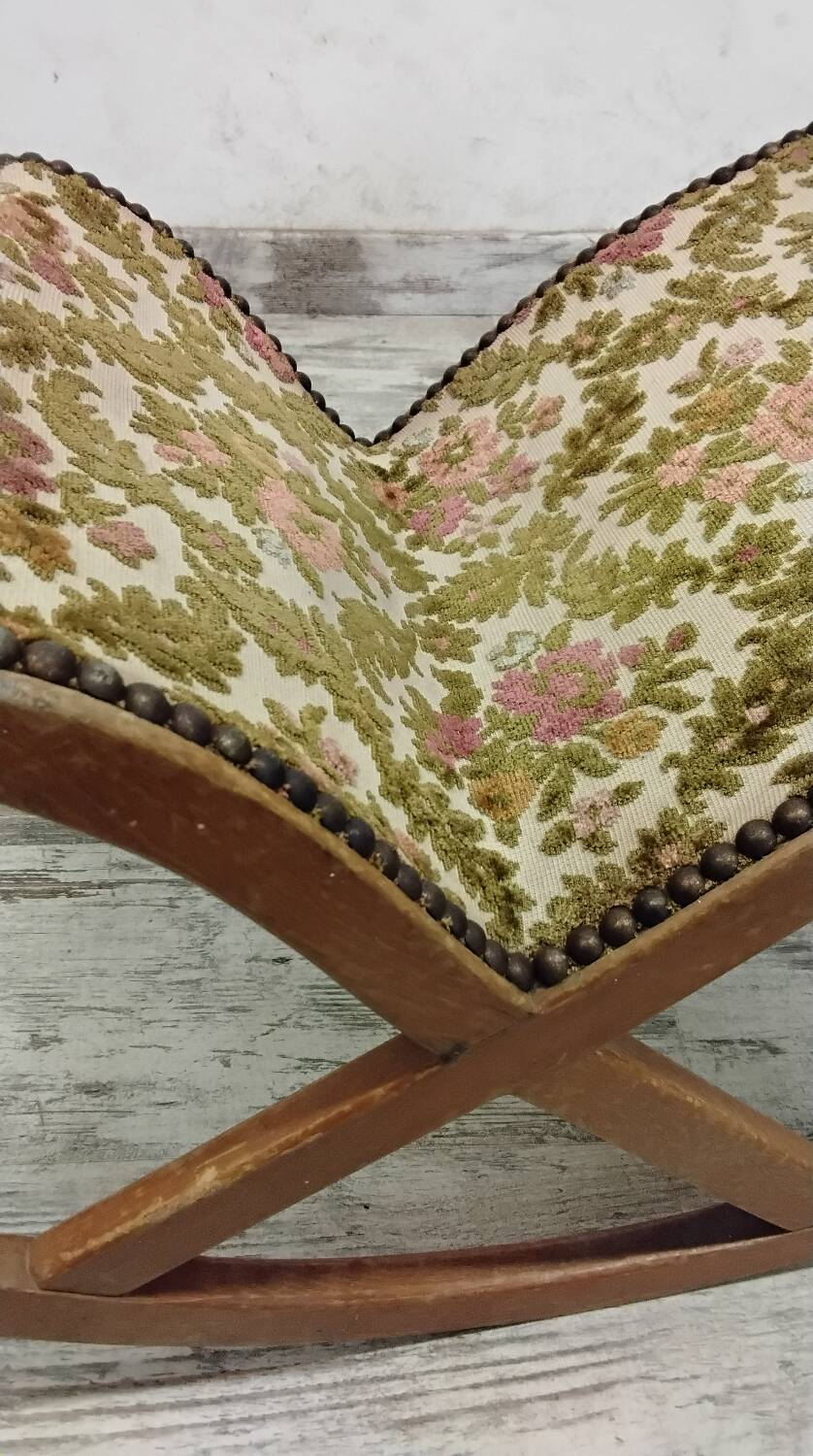 Antique rocking footrest