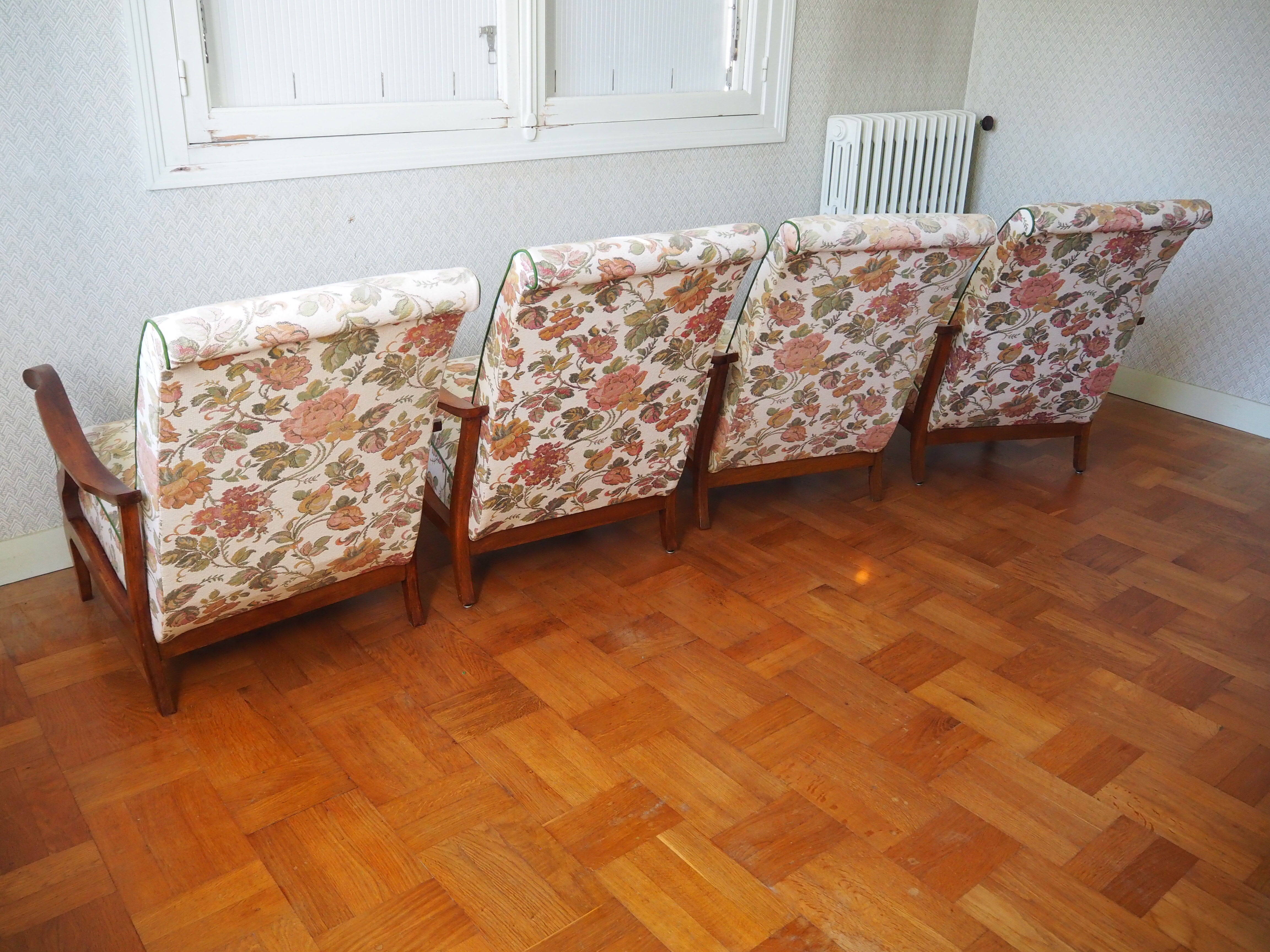 Four 1950s armchairs - wooden armrests