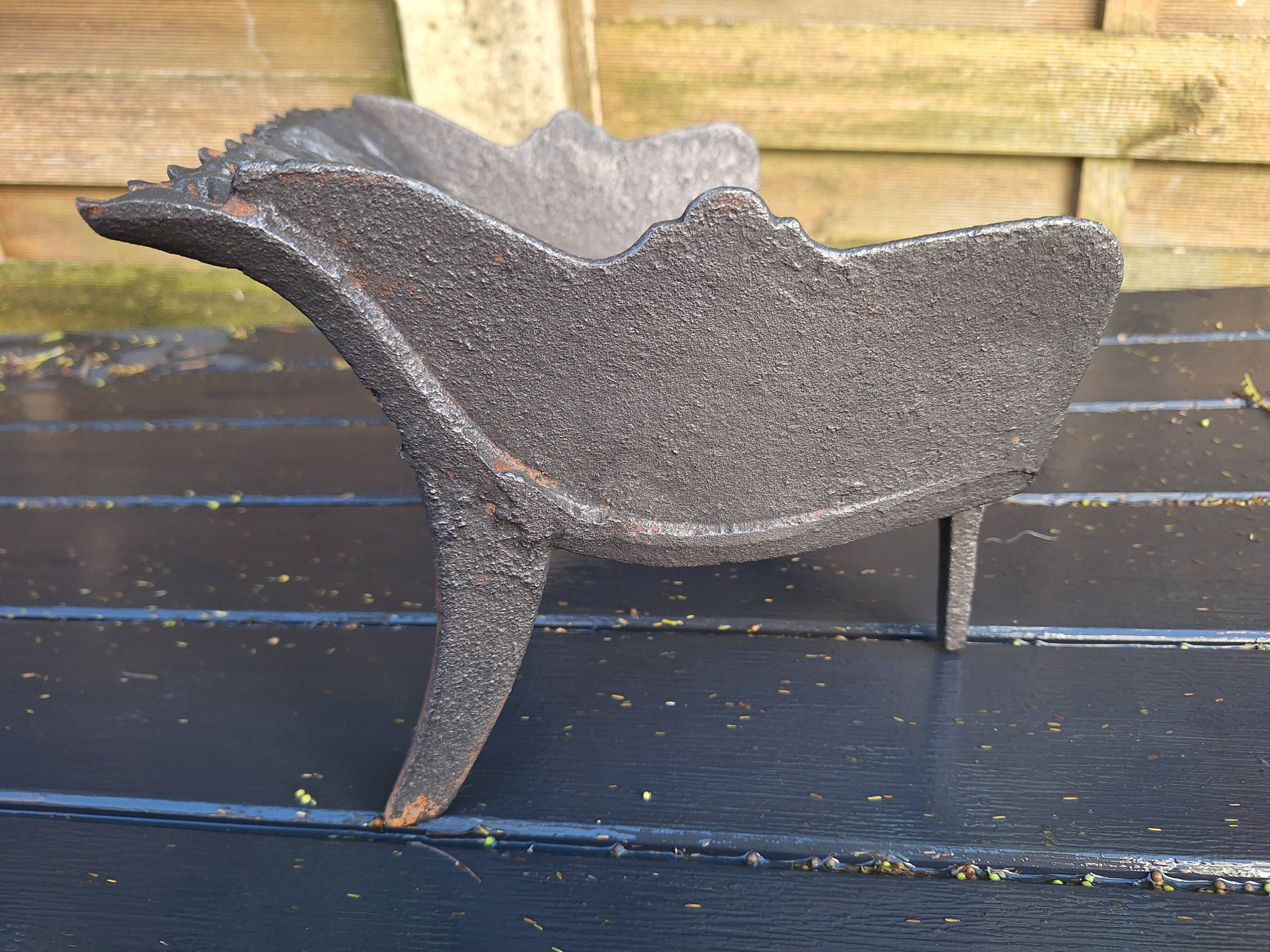 Antique cast iron log holder/ember holder for fireplace