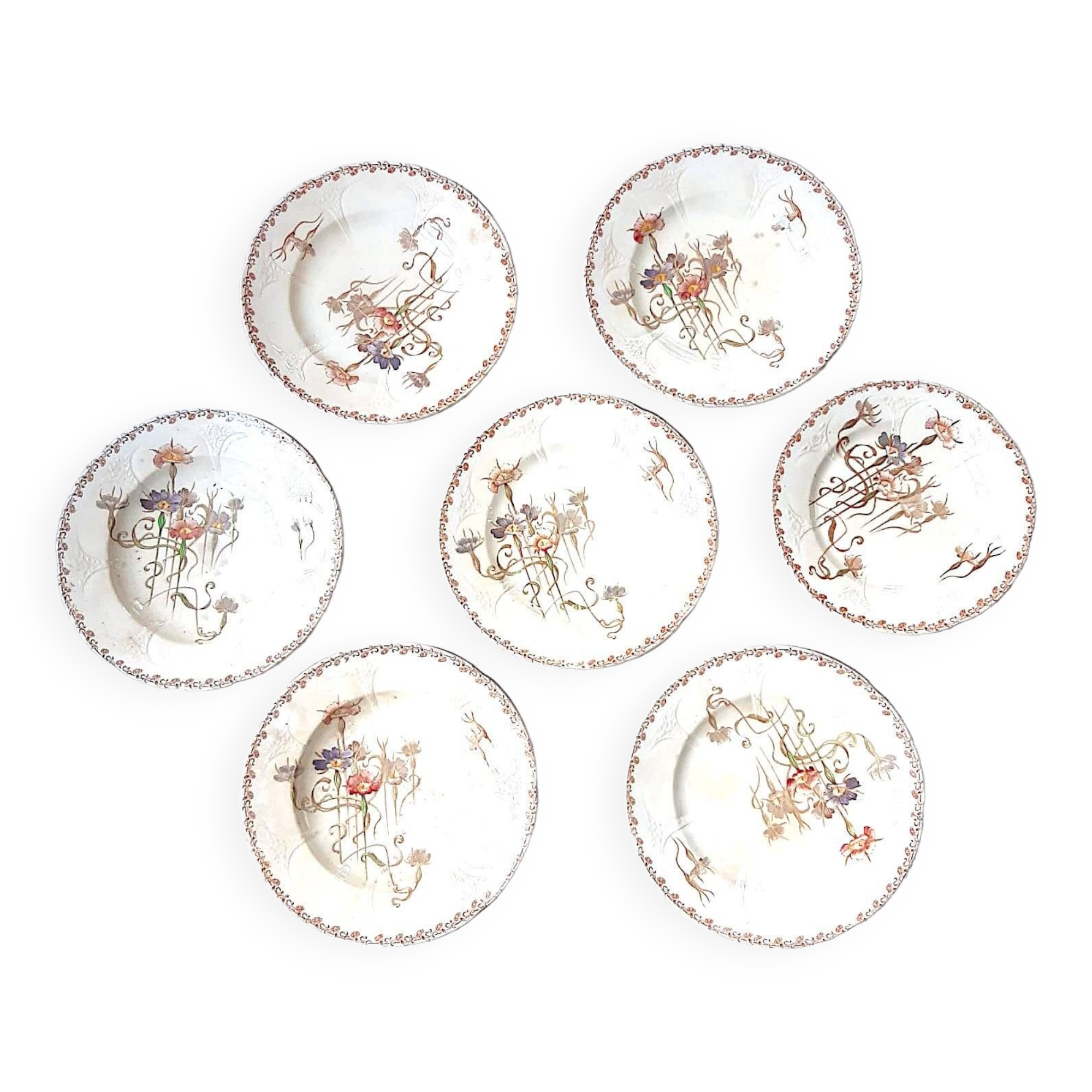 Set of 7 nielles model plates in longwy earthenware, art nouveau, circa 1900