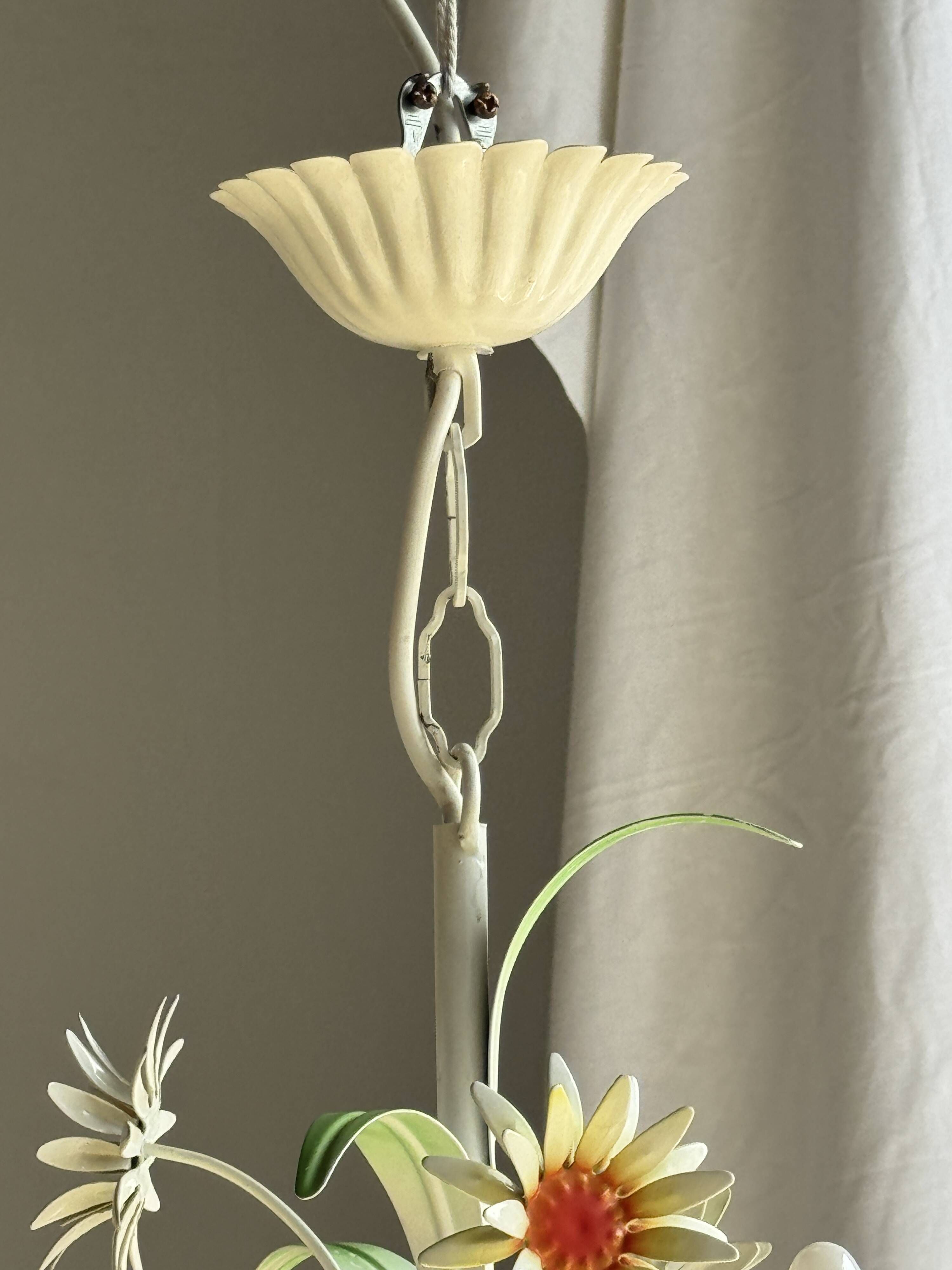 Small vintage cream metal flower chandelier with orange flowers and 3 arms.