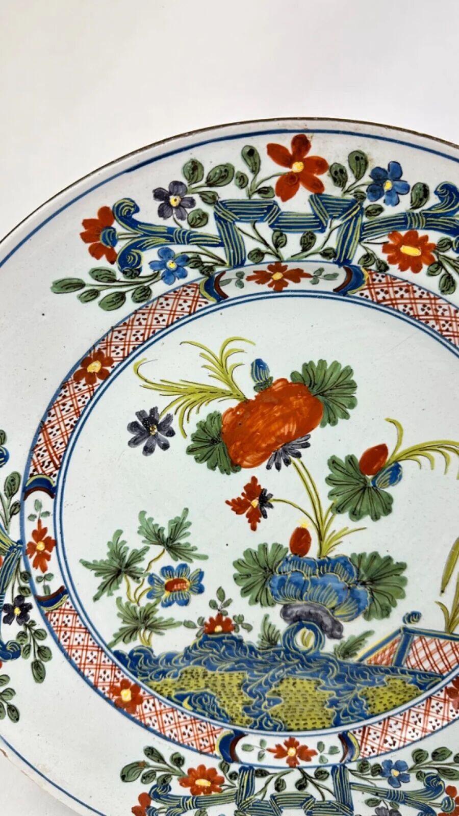 Delftware plate with gilded highlights, relief decoration, 18th century, 35 cm