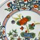 Delftware plate with gilded highlights, relief decoration, 18th century, 35 cm