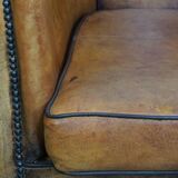 Fauteuil club en cuir de mouton