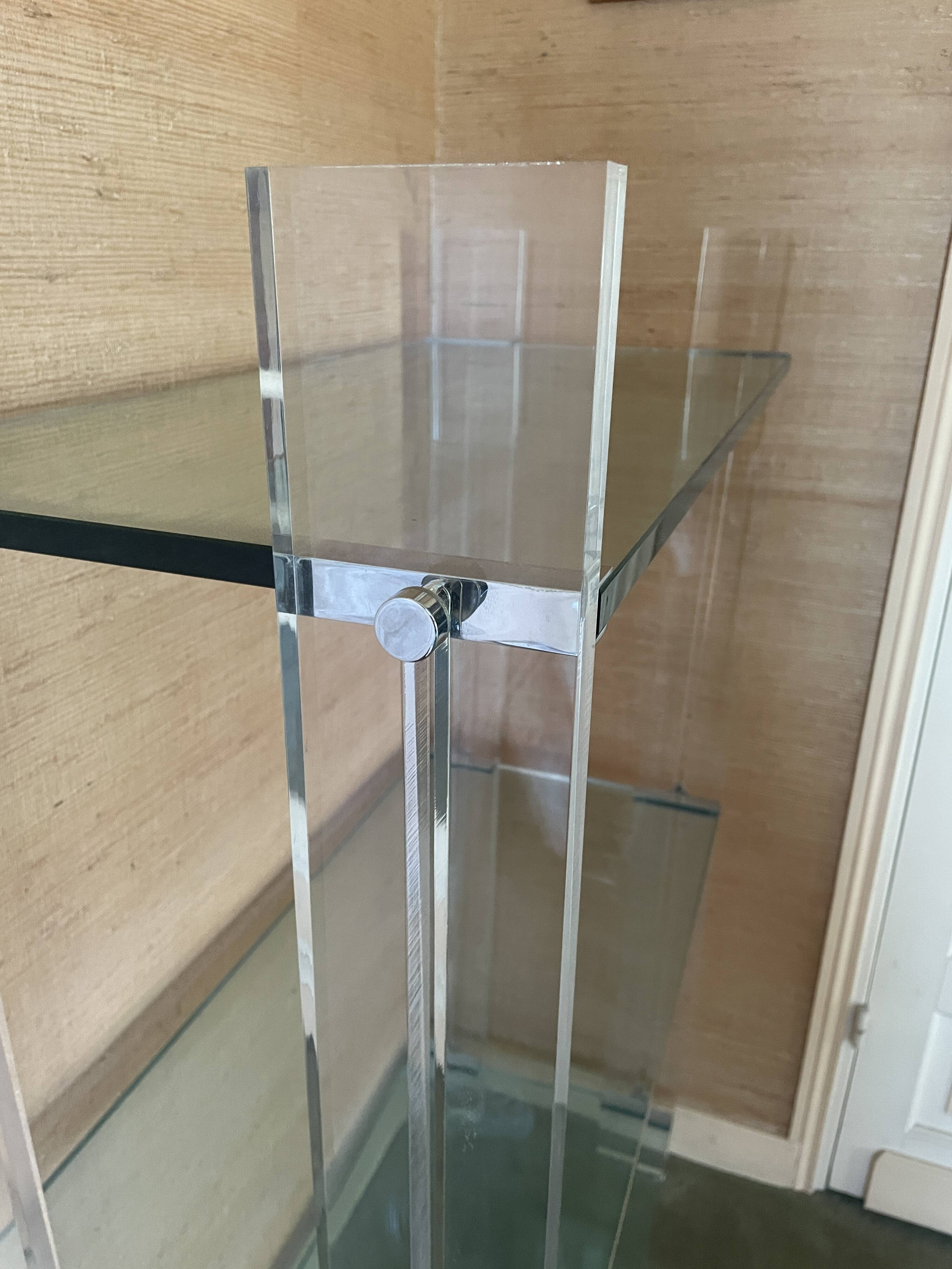 Shelf with 3 shelves in glass (shelves) and plexiglass (uprights) circa 1980.