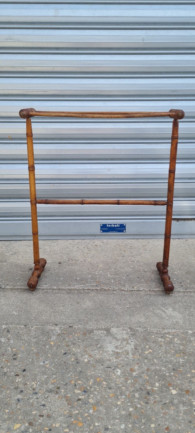 Turned wooden towel rack