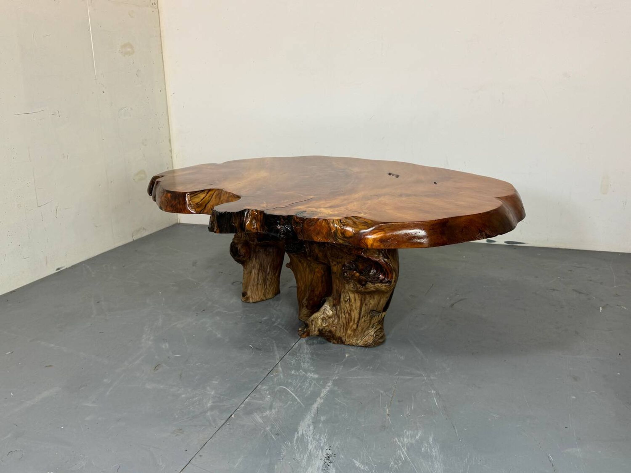 Brutalist Wabi Sabi mid-century coffee table made of natural biological burl wood.