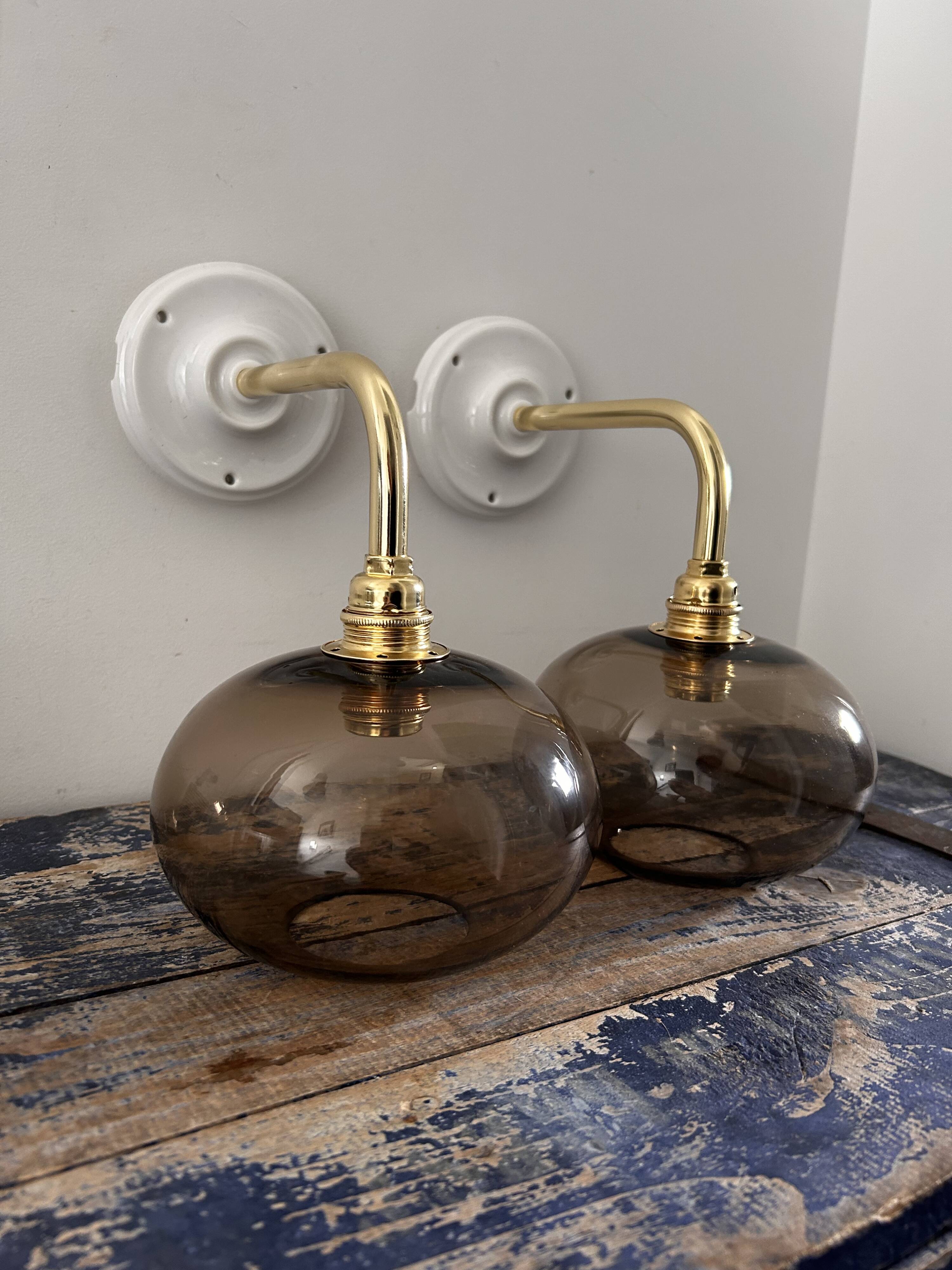 Pair of smoked glass wall lights