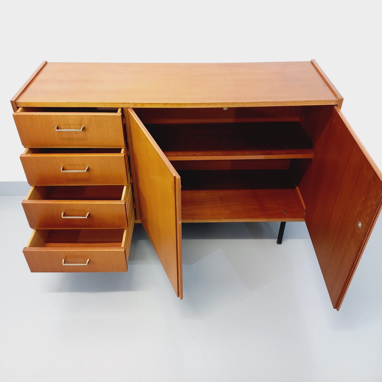 Vintage teak and black metal row from the 60s