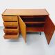 Vintage teak and black metal row from the 60s