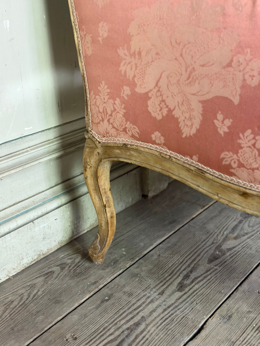 Louis XV bench in carved natural wood, 18th century