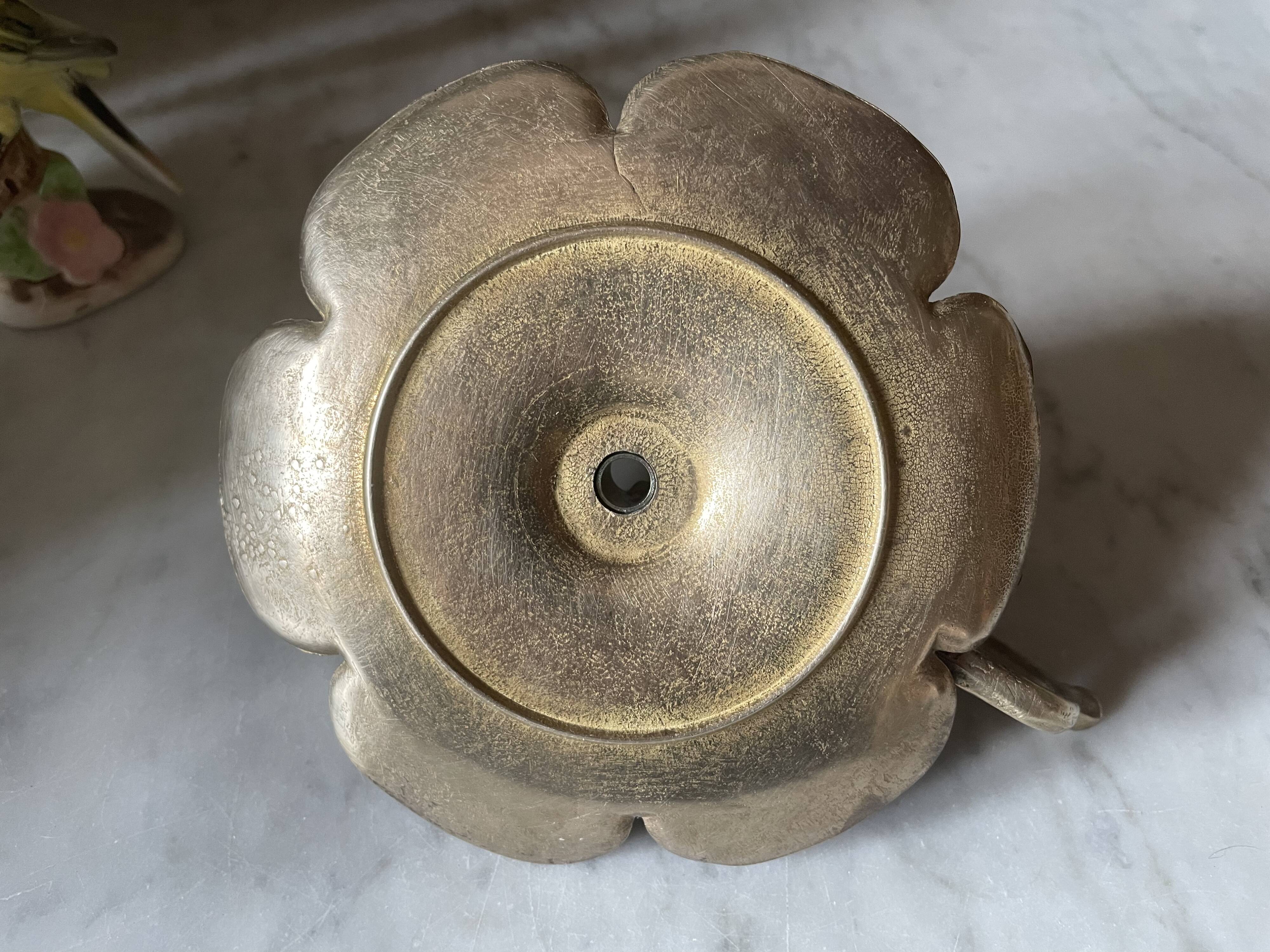 Brass flower candle holder