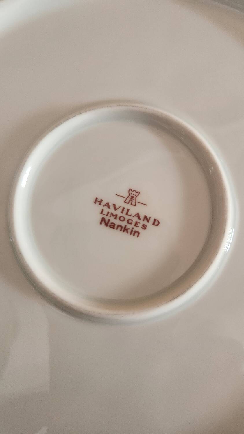Round serving dish with handles (probably a cake dish or a plate)