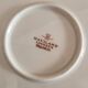 Round serving dish with handles (probably a cake dish or a plate)