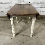 Round walnut drop leaf table