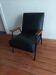 Fauteuil vintage en cuir et métal noir