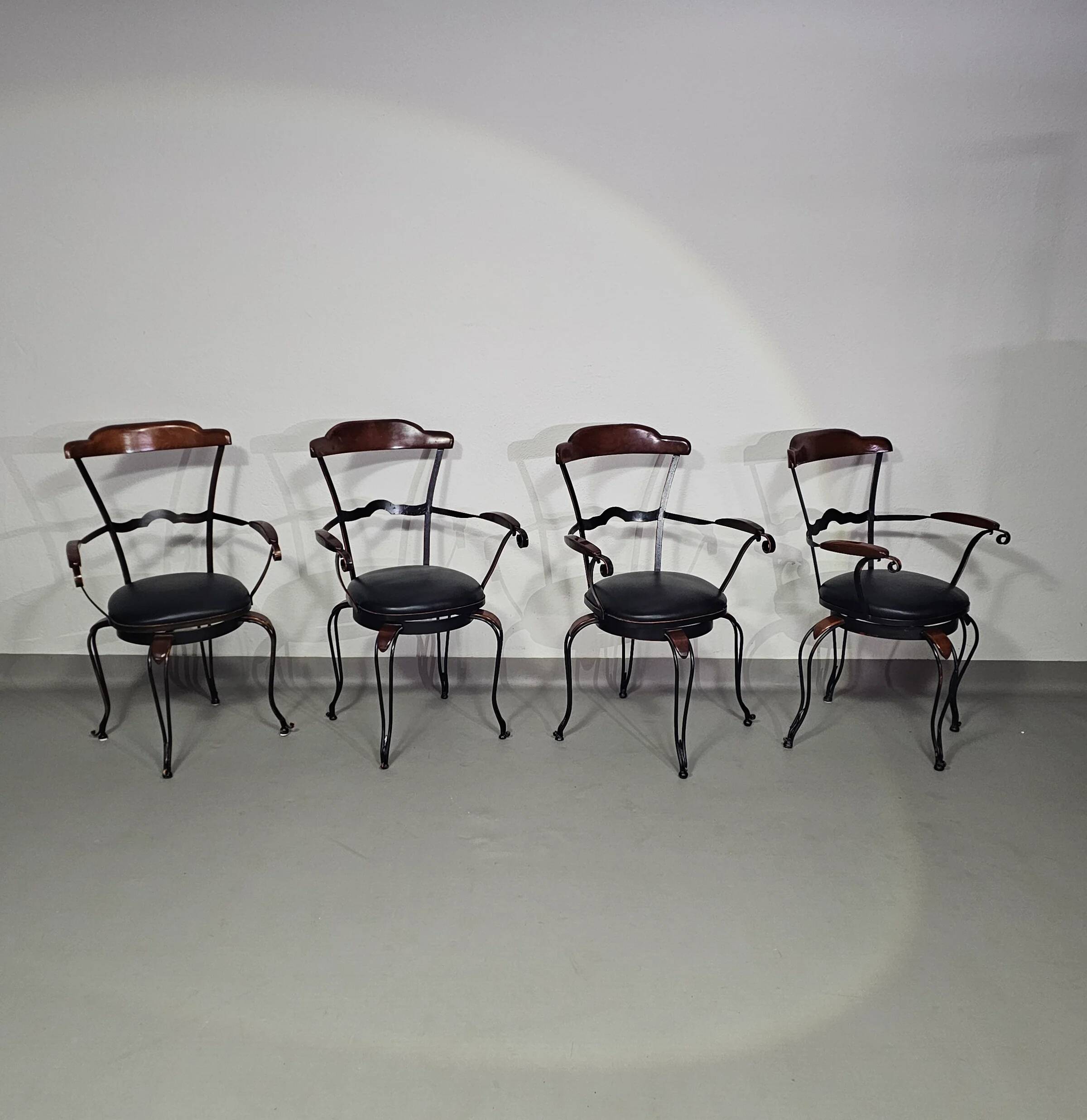 Italian postmodern turnable wrought iron dining chairs with leather seats