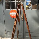Industrial projector on tripod waxed wood
