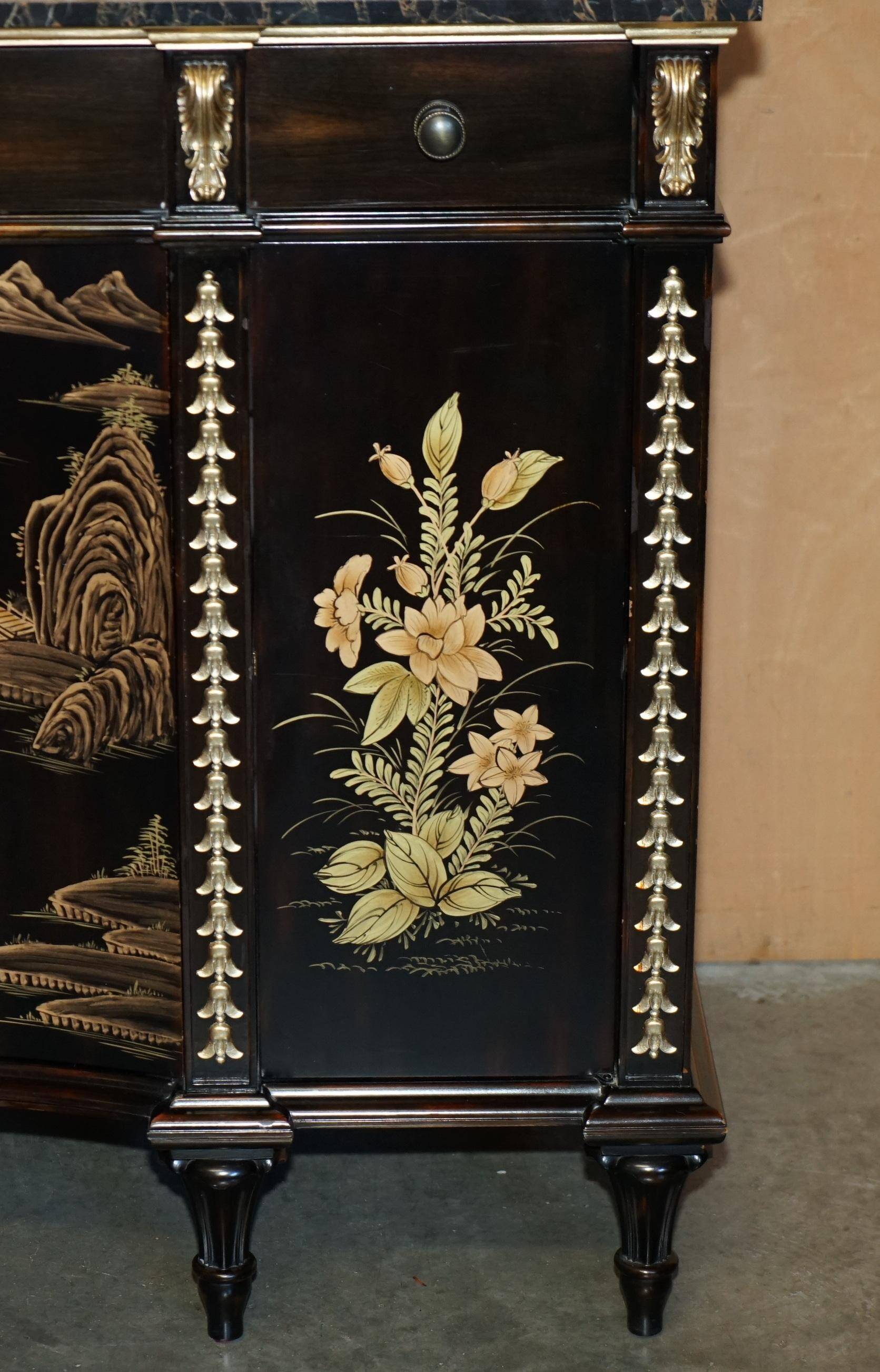 Contemporary Chinese buffet with a marble top and space for a mini-fridge.