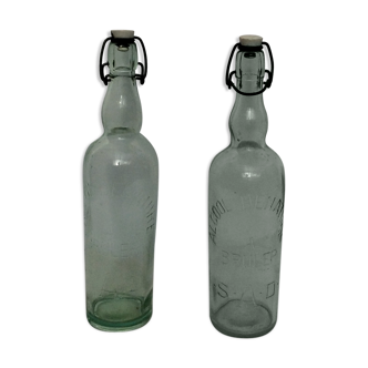 Two old bottles, alcohol denatured to burnt ,S.A.D 1 liter Height -35cm- diameter -8cm-